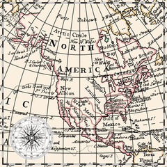 Obraz premium An old historical vintage map of the North America with the names of continents, islands and oceans, and the routes of navigators.
