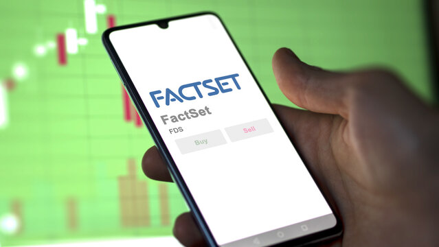 April 09th 2024 , Norwalk, Connecticut. Close up on logo of FactSet on the screen of an exchange. FactSet price stocks, $FDS on a device.