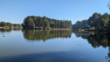 lake, water, sky, landscape, nature, reflection, river, forest, blue, tree, green, trees, summer, pond, cloud, park, outdoors, clouds, grass, spring, beautiful, calm, natural, tranquil, panorama