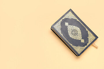 Koran on beige background. Ramadan celebration