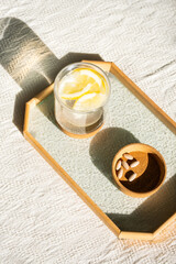 lemon water and nutritional supplement capsules for self care.