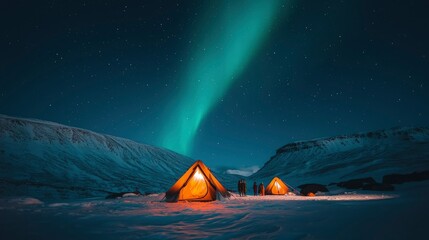 Camping under Northern Lights in snowy mountains