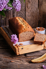Almond banana bread. Powdered sugar, lilac, pie pieces.