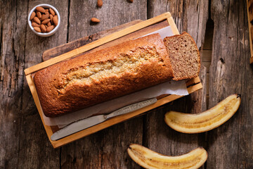 Almond banana bread. Powdered sugar, lilac, pie pieces.