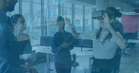 Image of financial data processing over biracial woman using vr headset in office
