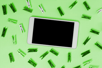 Important Message Presented On Phone On Desk With lothespins, Paper. Crutial Information Shown On Cellphone Screen Placed On Table. New Ideas On Mobile Phone.