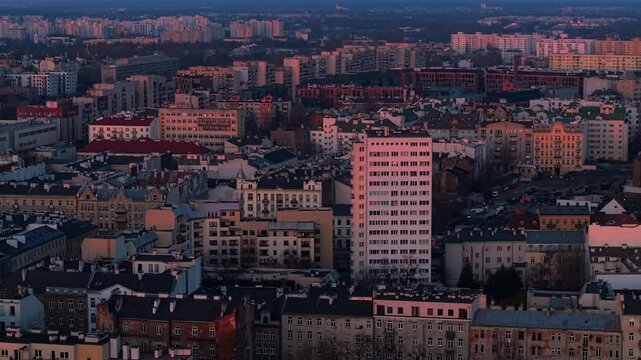 Warsaw at sunset showing the praga district with residential buildings from the 70s and 80s, aerial view