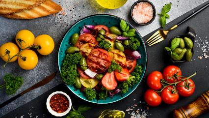 Fresh vegetable summer colorful salad. Vegetarian food. Top view.