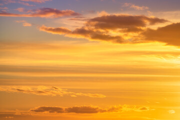 Dramatic red, orange, and yellow real fiery sky at sunset. Suitable for sky replacement, background or graphic design