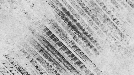 Black tire marks on road, Black rubber tire marks and tread marks, Tire trace track wheels texture...