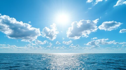 Obraz premium A sunny summer sky over a beautiful ocean. Perfect for a vacation! 