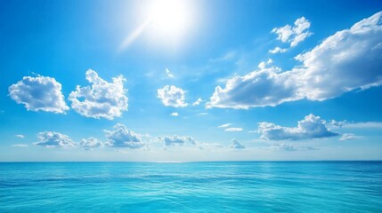 Obraz premium A sunny summer sky over a beautiful ocean. Perfect for a vacation! 