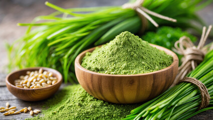 A wooden bowl filled with finely green organic powder like wheatgrass, surrounded by fresh, vibrant green wheatgrass herb blades, on a wooden table, in a rustic, natural layout