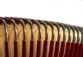 detail of old accordion bellows isolated on white.