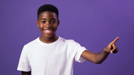 Portrait of young boy with positive expression and index finger pointing, possibly suggesting a message or concept.