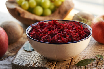 Grated fresh beetroot in a bowl. Vegetable salad.