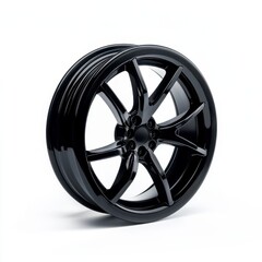 Obraz premium Glossy black alloy wheel with five spokes against a white background. Studio shot, detailed view of a single wheel
