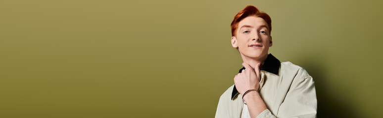 Emotional moment captured with a young man showcasing charm and confidence in a serene setting