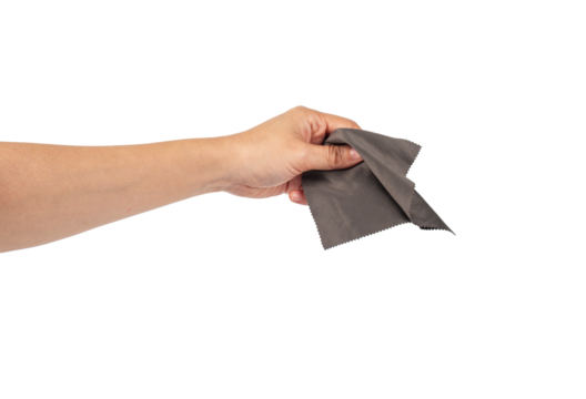 Hand and crumpled microfiber cleaning cloth, isolated on transparent background