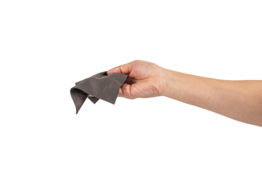 Hand and crumpled microfiber cleaning cloth, isolated on transparent background