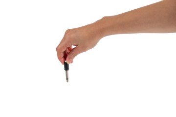 Hand and black audio cable aux isolated on transparent background