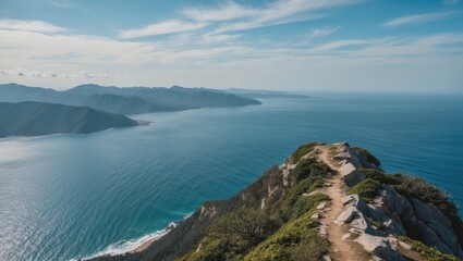 Fototapeta premium Breathtaking Ocean View from Mountain Peak with Scenic Landscape and Clear Sky Ideal for Inspirational Text and Travel Content