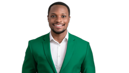 Portrait of a smiling African businessman in a green suit