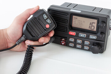 Trunk radio hand handle with speaker and display showing communication information