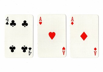 A hand of three playing cards on a white background.