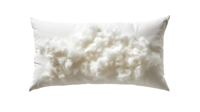 Soft white pillow filled with fluffy material displayed on a plain background