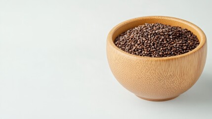 A bowl filled with nutritious chia seeds on a light background perfect for health