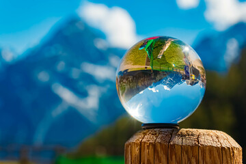 Crystal ball alpine summer landscape shot at Mount Grubigstein, Lermoos, Reutte, Tyrol, Austria