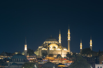 Fototapeta premium Suleymaniye and Rustem Pasa Mosques at night. Ramadan background photo