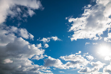Partly cloudy sky background photo. Weather forecast concept.
