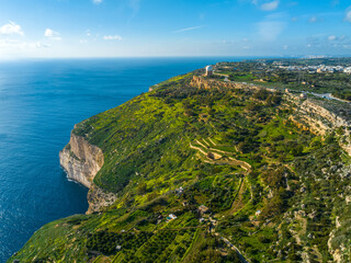 Drone aerial view of Dingli cliffs. Mediterranean sea, blue sky. Maltese island
