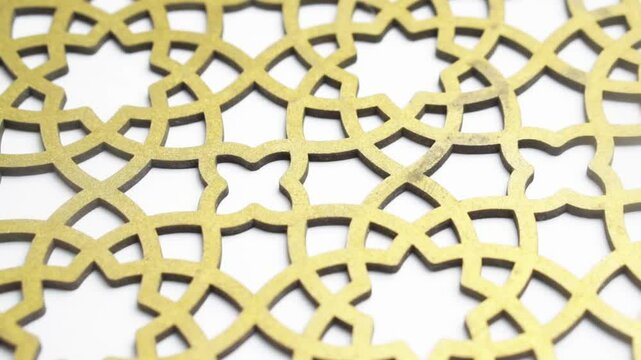 Islamic seamless pattern. Repeating gold arabesque background.