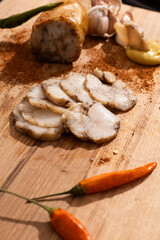 lard fat tallow bacon pepper garlic on a cutting board natural snacks close photo