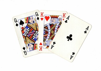 A hand of vintage playing cards isolated on a white background.