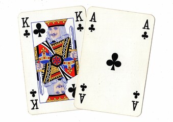 A blackjack or pontoon hand of vintage playing cards isolated on a white background. © Philip