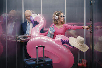 Rude tourist carrying a huge inflatable toy in the lift