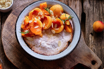 Dutch pancake with apricot and almond petals. Top view.