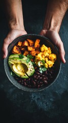  ceramic bowls filled with  Protein Breakfast Bowls, featuring roasted sweet potatoes, black beans, scrambled eggs, and avocado, garnished with fresh cilantro and chili flakes. 