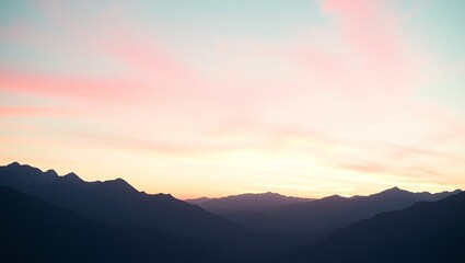 Obraz premium Mint Green and Pink Dusk Sky with Silhouetted Mountains