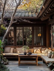 Fototapeta premium An outdoor courtyard features a seating area and a low table