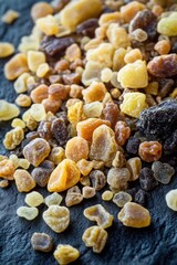 A collection of raisins displayed on a flat surface