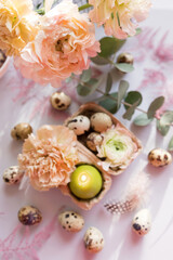 Easter concept, eggs and flowers