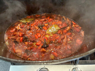Rich Vegetable Stew Bubbling in Dark Pot