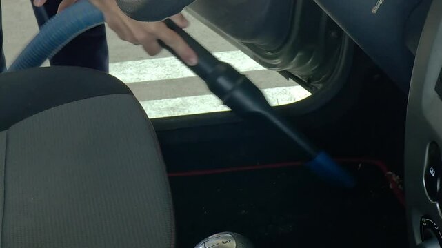 Man Car Clean and vacuum