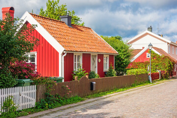 Idyllic little cottages on a street in a Swedish city