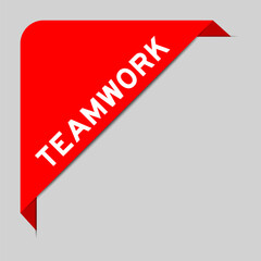 Red color of corner label banner with word teamwork on gray background